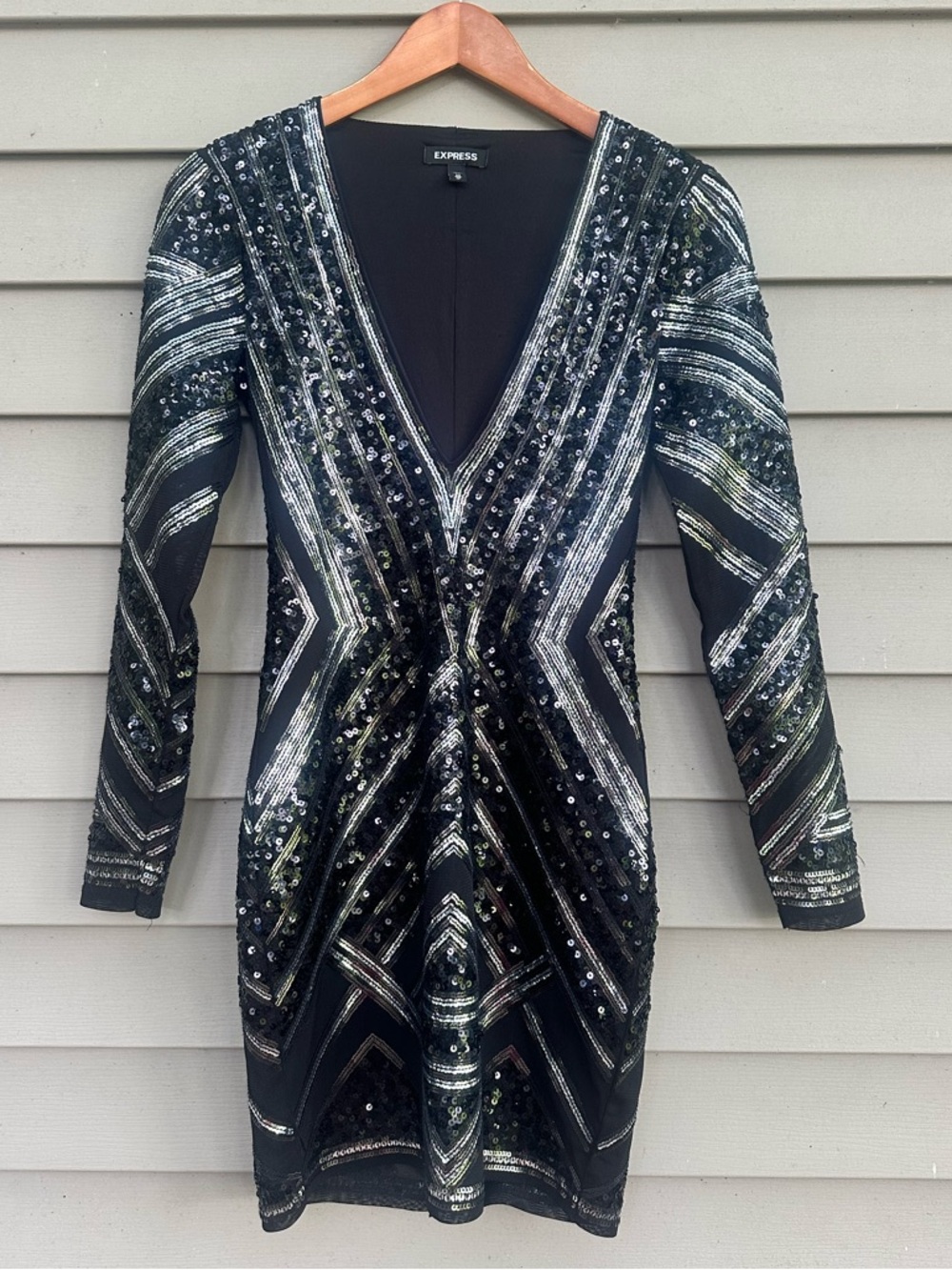 Sequin bandage dress deep V plunging mini
XS Express